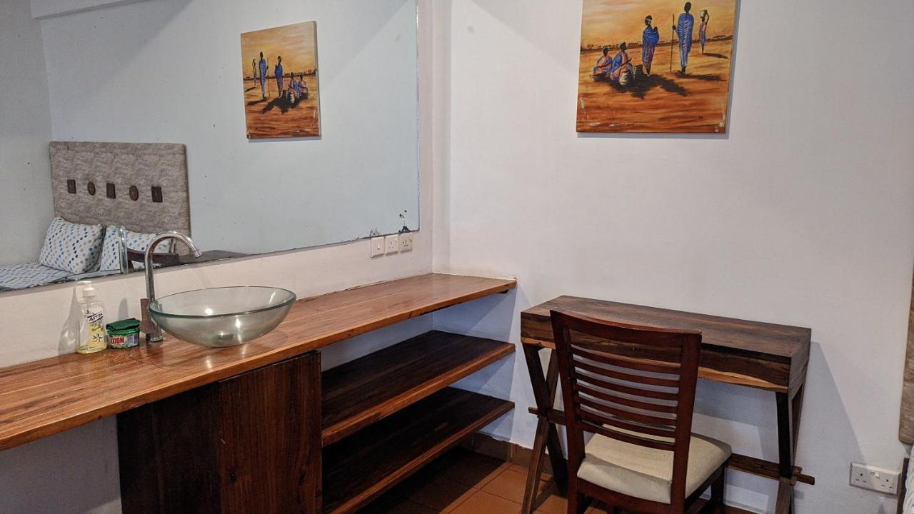A Lovely Studio Apartment With Gym And Pool Access Дар-эс-Саламе Экстерьер фото